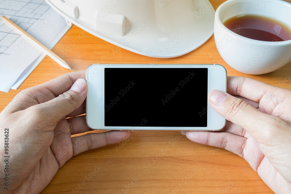 Asian woman holding a empty screen of smart phone. for on-line shopping.selective focus