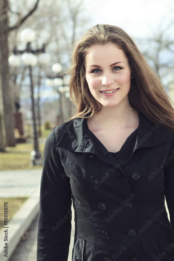 Portrait of beautiful brunette girl walking Portrait of beautiful brunette girl walking