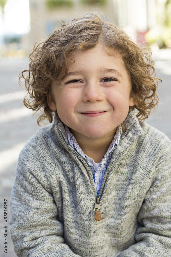 portrait of a boy on a urban background portrait of a boy on a urban background