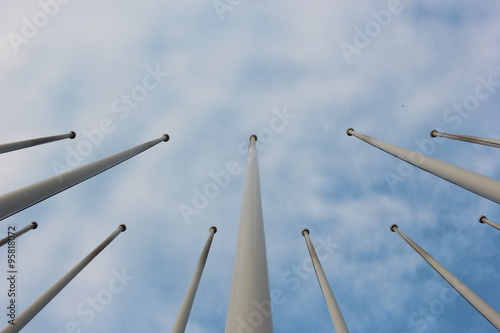 Group of flagstaff and sky background