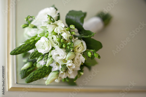 bride holds bouquet