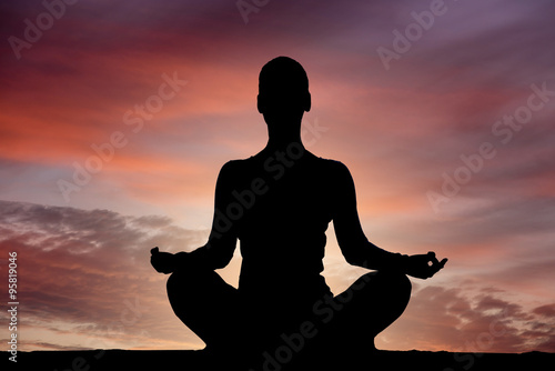 Fototapeta Naklejka Na Ścianę i Meble -  Yoga silhouette outdoor at sunset