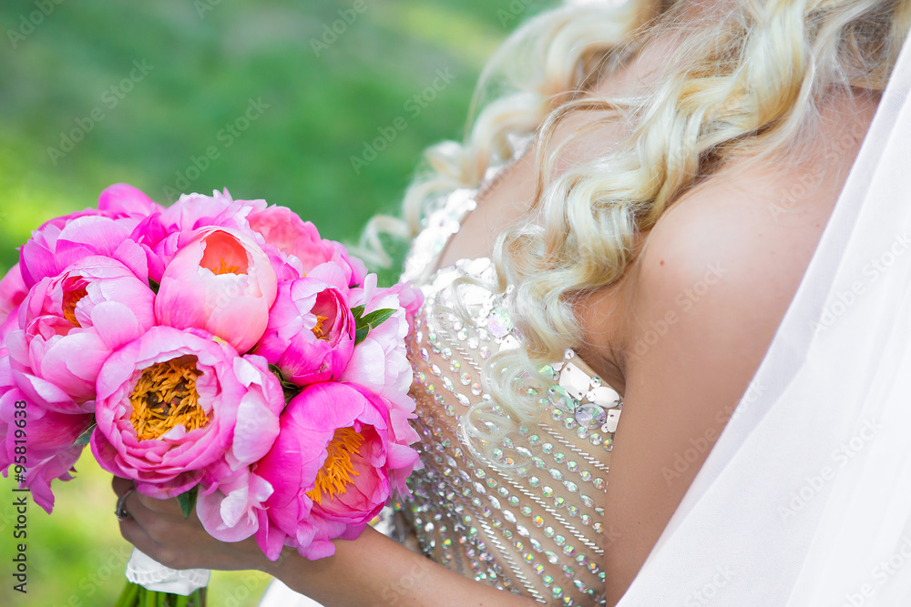 bride holds bouquet