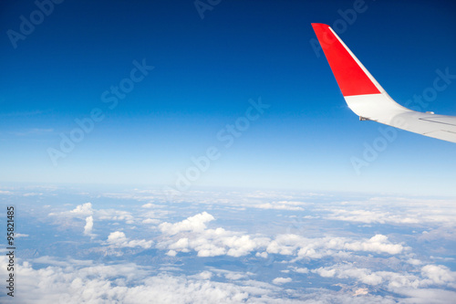 sky as seen through window of an aircraft