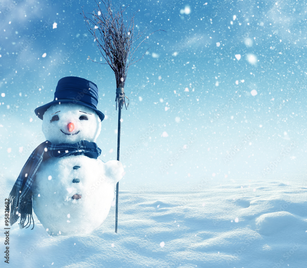 Plakat Happy snowman standing in winter christmas landscape