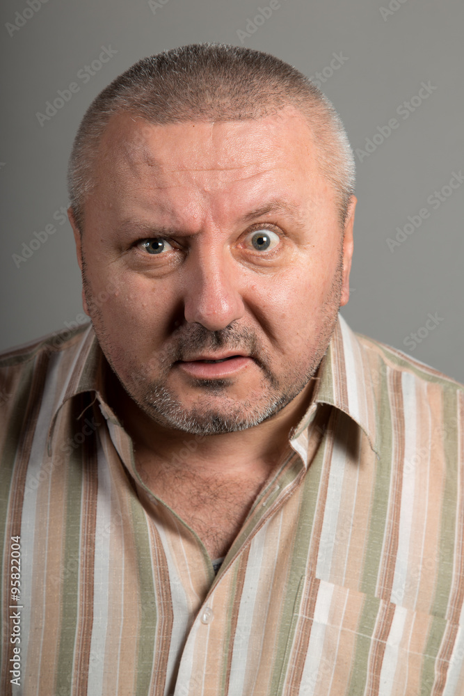 Surprised man winking Surprised man winking