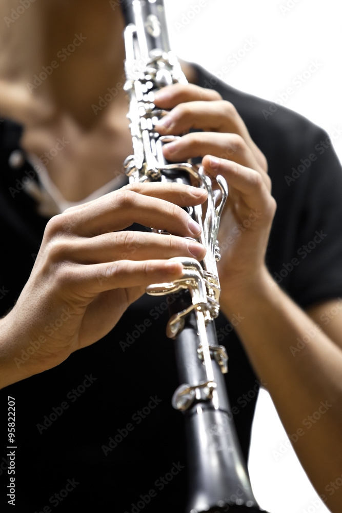Fototapeta premium Hands musician playing the clarinet