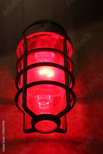 a large red industrial light