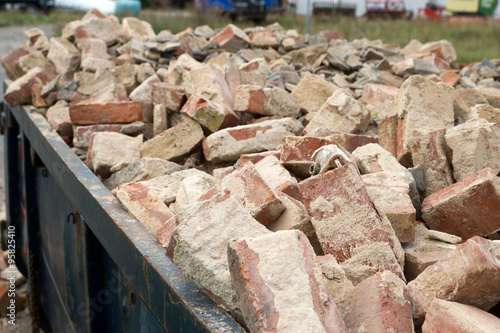 Container / Container full of Building rubble and stones photo