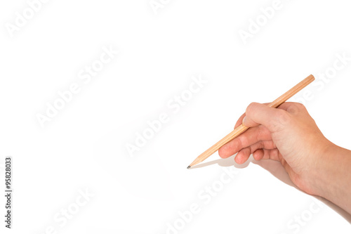 Hand mit Bleistift vor weißer Fläche