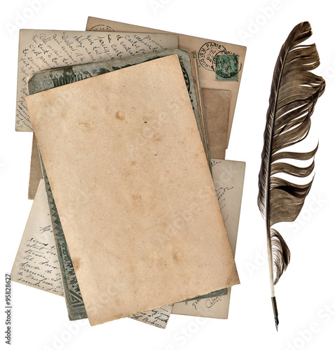 Grungy paper page, antique postcards and vintage ink pen