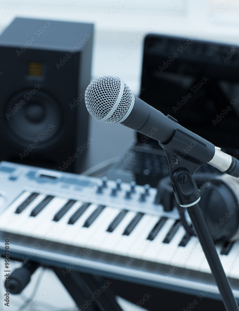 Studio room with synthesizer and record equipment. Studio room with synthesizer and record equipment.