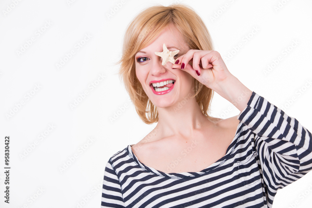 Young funny woman holding sea star and smiling, waiting vacation. White background Young funny woman holding sea star and smiling, waiting vacation. White background