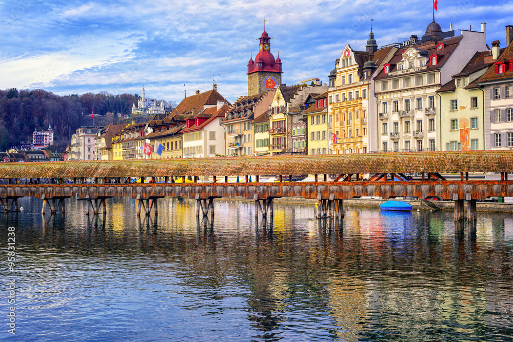 Lucerne, Switzerland, view over Reuss river to the old town and wooden Chapel bridge