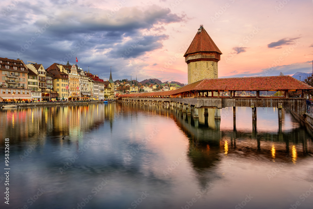 Wooden Chapel Bridge and Water Tower on sunset, Lucerne, Switzerland