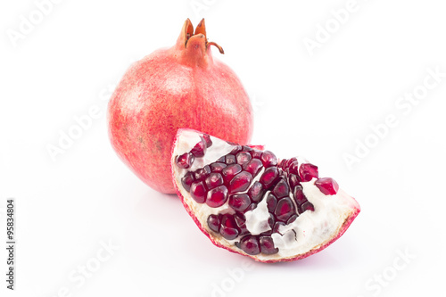 Ripe pomegranate isolated on white