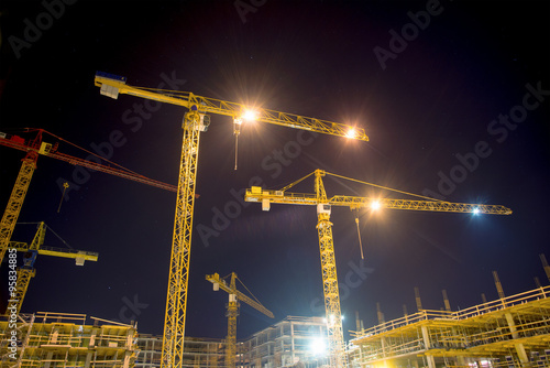 cranes and illumination at night