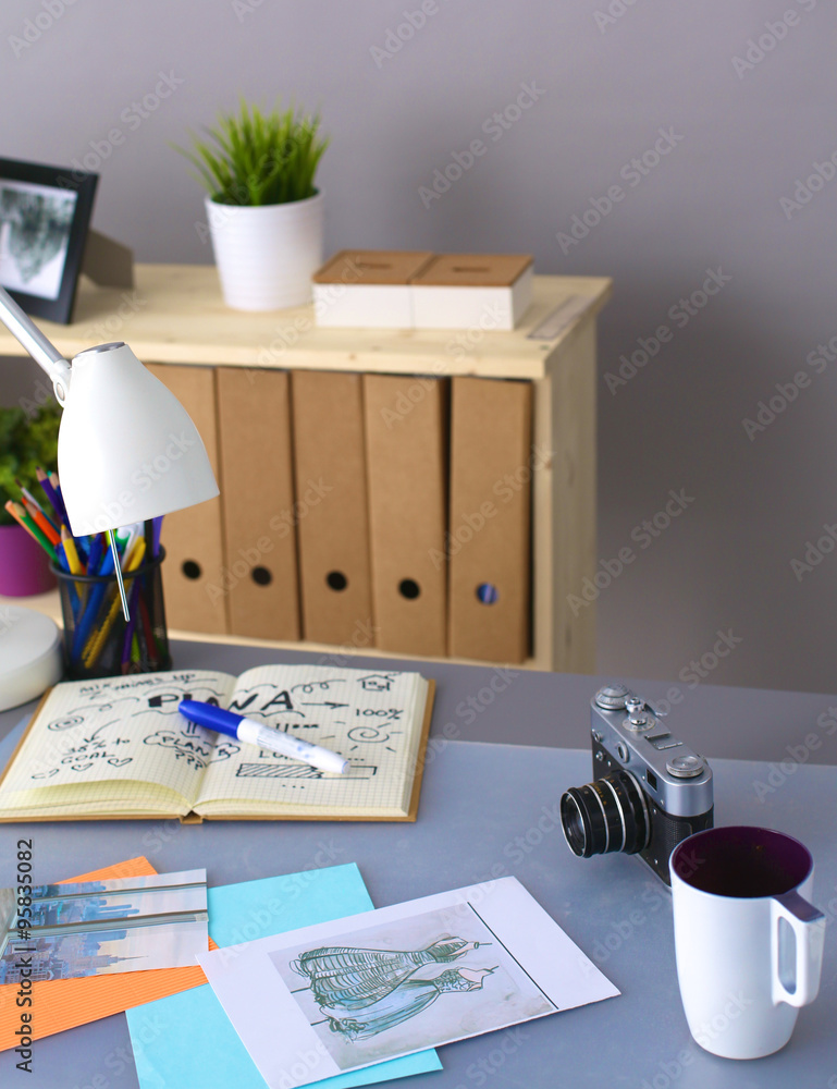 Obraz premium Designer table with him lying on the instruments and camera