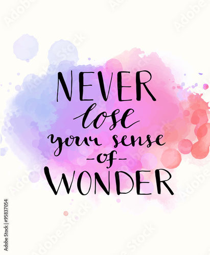 Never lose your sense of wonder. Black inspirational quote on purple watercolor imitation background, brush typography for poster, t-shirt or card. Vector calligraphy art