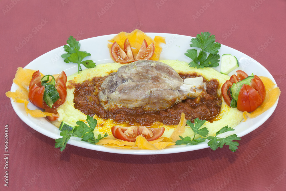 pork shank on a bed of polenta amatriciana pork shank on a bed of polenta amatriciana