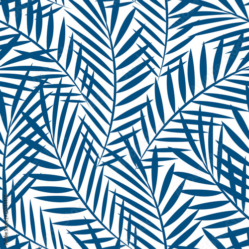 Tropical blue palm tree leaves in a seamless pattern