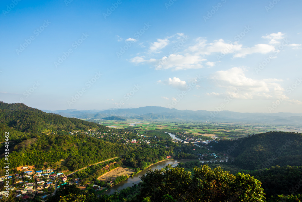 Landscape of mountains and countryside.