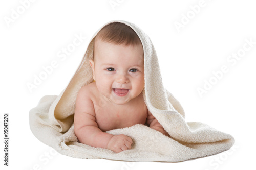 baby in towel is isolated on a white background. photo