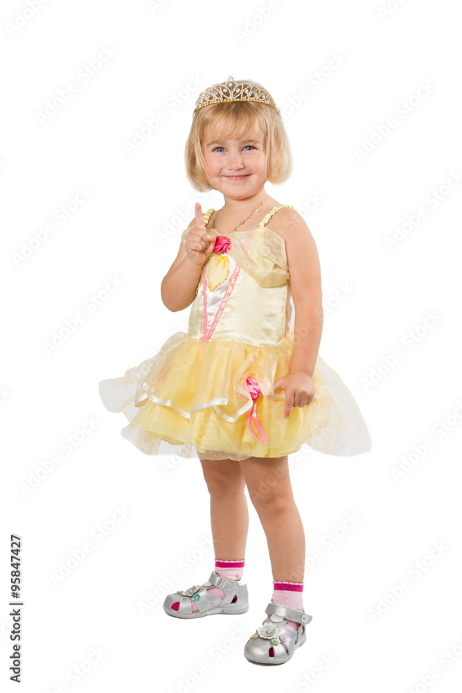 Little girl in a beautiful yellow dress and crown on white back Little girl in a beautiful yellow dress and crown on white back