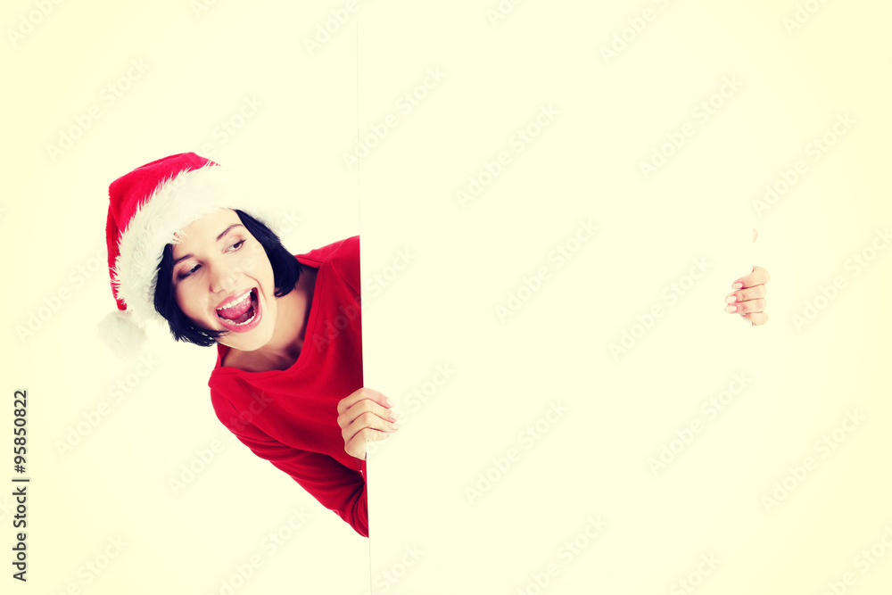 Santa girl holding blank board Santa girl holding blank board