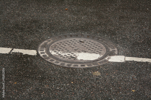 road markings on sewer manhole