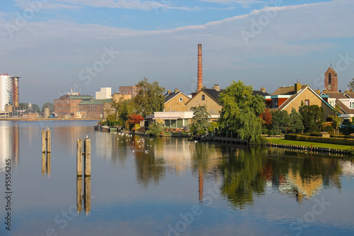 View of Halfweg from Zwanenburg through the canal Ringvaart, the