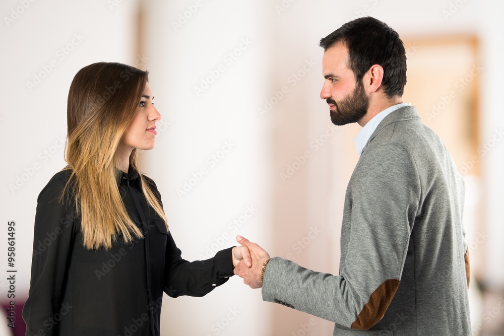 businessperson making a deal over isolated white background businessperson making a deal over isolated white background