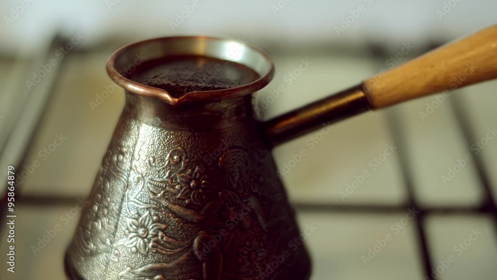 Boil coffee Cezve on a gas cooker Boil coffee Cezve on a gas cooker