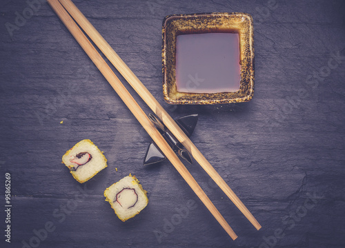 Closeup of fresh sushi on rustic wooden table