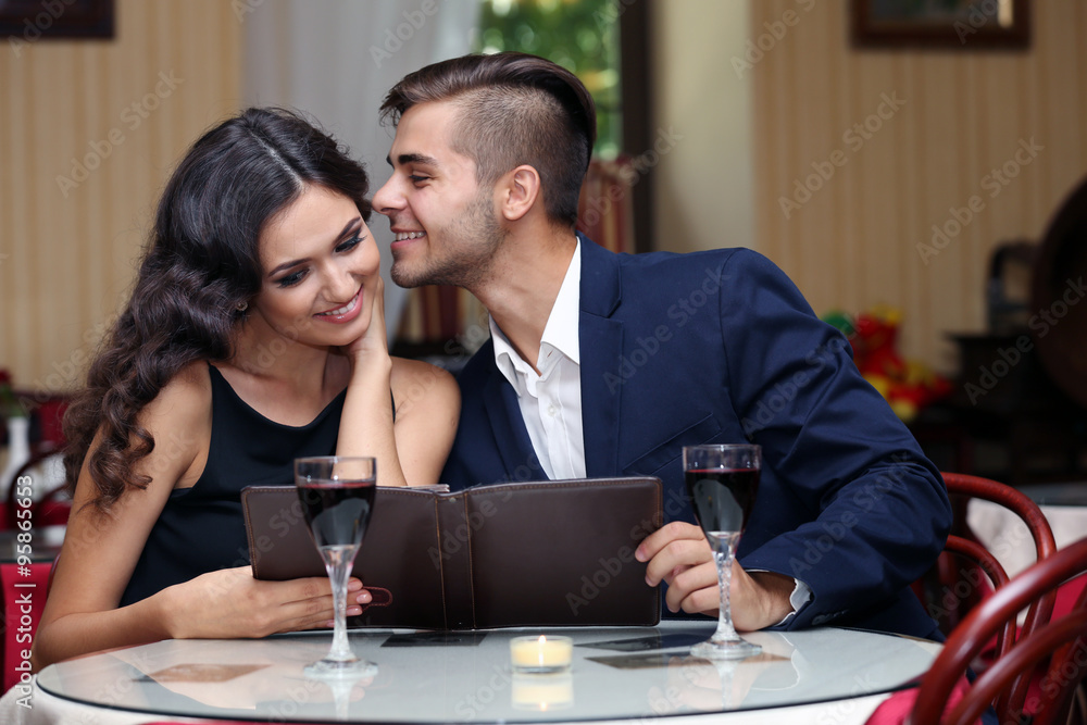 young couple flirting at the restaurant young couple flirting at the restaurant