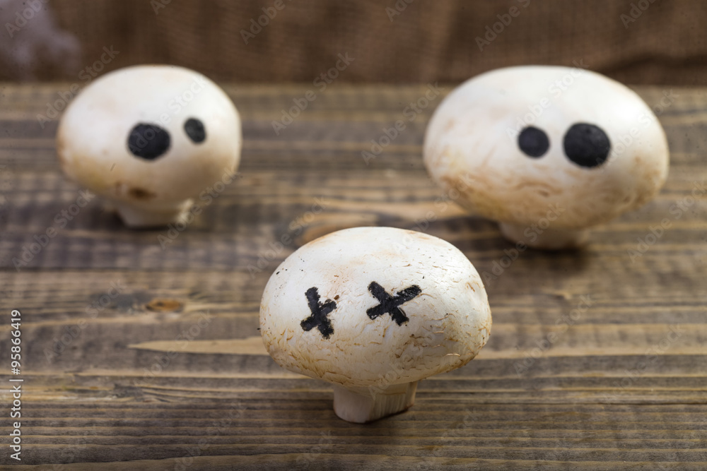 Halloween champignons with ghost face Halloween champignons with ghost face