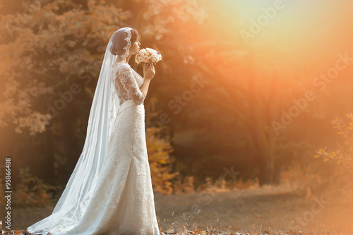 Fotografie Young bride in forest