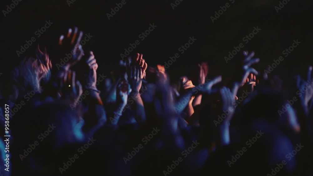 Concert people crowd fans hands in the air.Various crowd shots from an outdoors summer/autumn rock music festical
