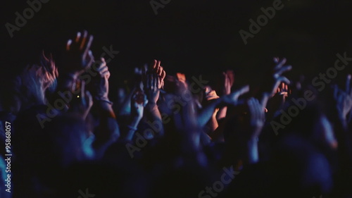 Concert people crowd fans hands in the air.Various crowd shots from an outdoors summer/autumn rock music festical