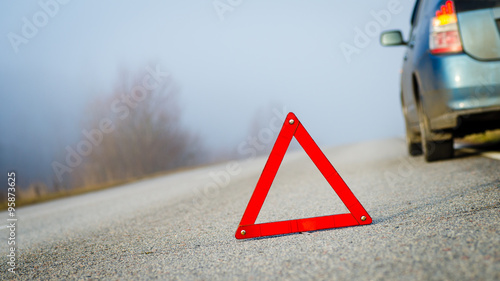 Emergency triangle on the road.