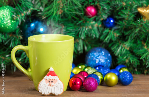 Christmas decoration. Gingerbread cookies. Cup of hot beverage