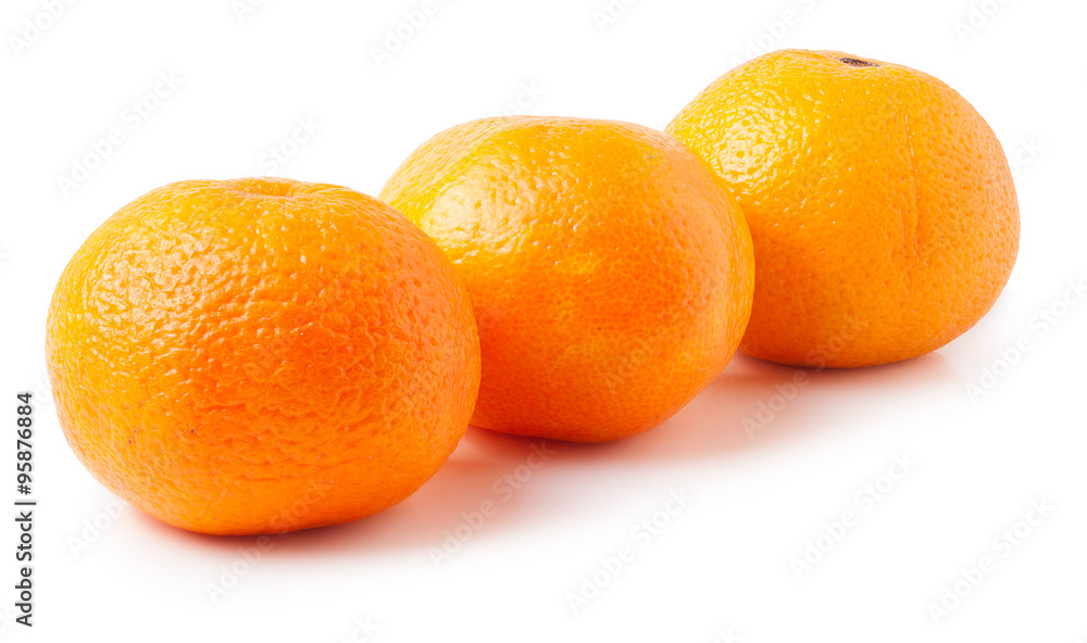 Three ripe mandarins isolated on white background Three ripe mandarins isolated on white background
