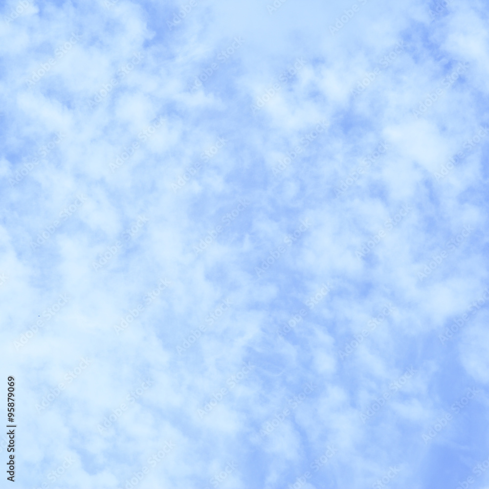 Light blue sky with clouds