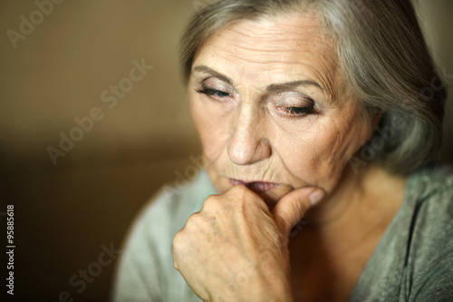 Thoughtful elderly woman