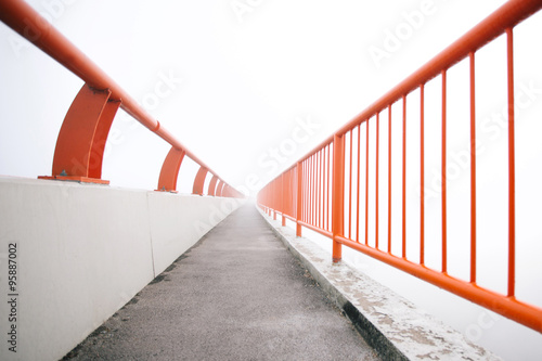 Fotografija Bridge vanishing point in fog