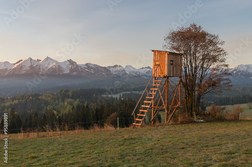Hunting tower with Tatra mountains in the background early morning