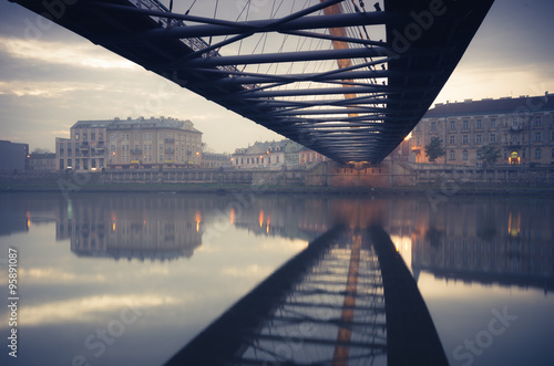 Bernatka footbridge over Vistula river in Krakow early morning #95891087