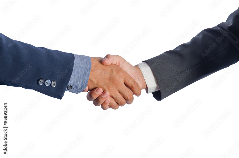 Two Asian businessmen shake hands.