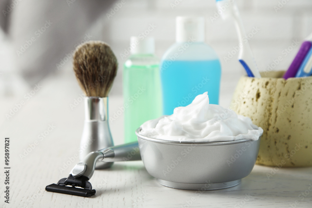 Male luxury shaving kit on shelf, on bricks wall background Male luxury shaving kit on shelf, on bricks wall background