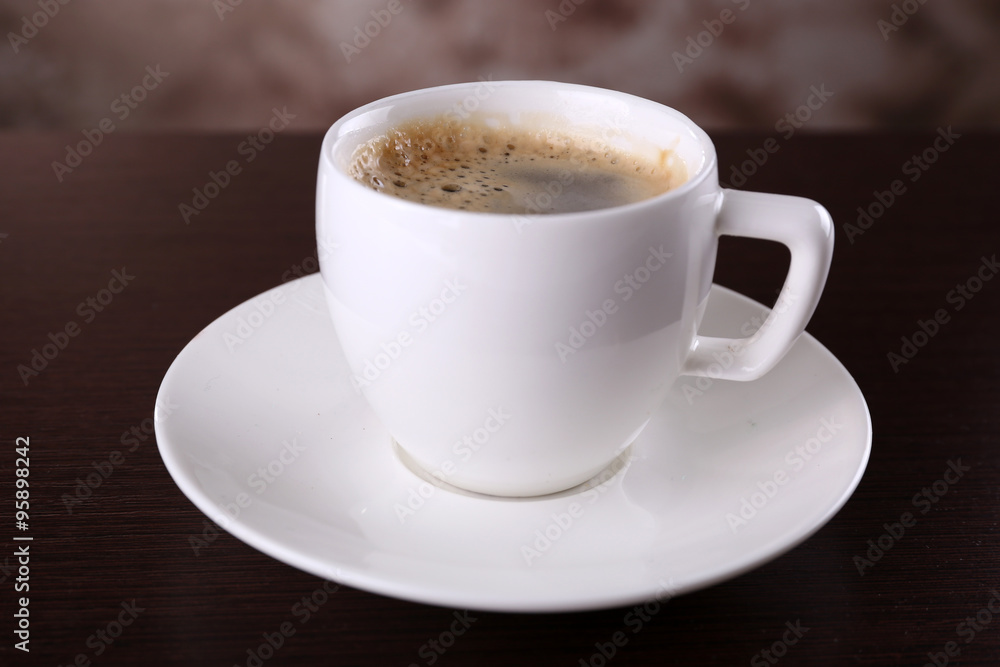 Cup of coffee on table close up Cup of coffee on table close up